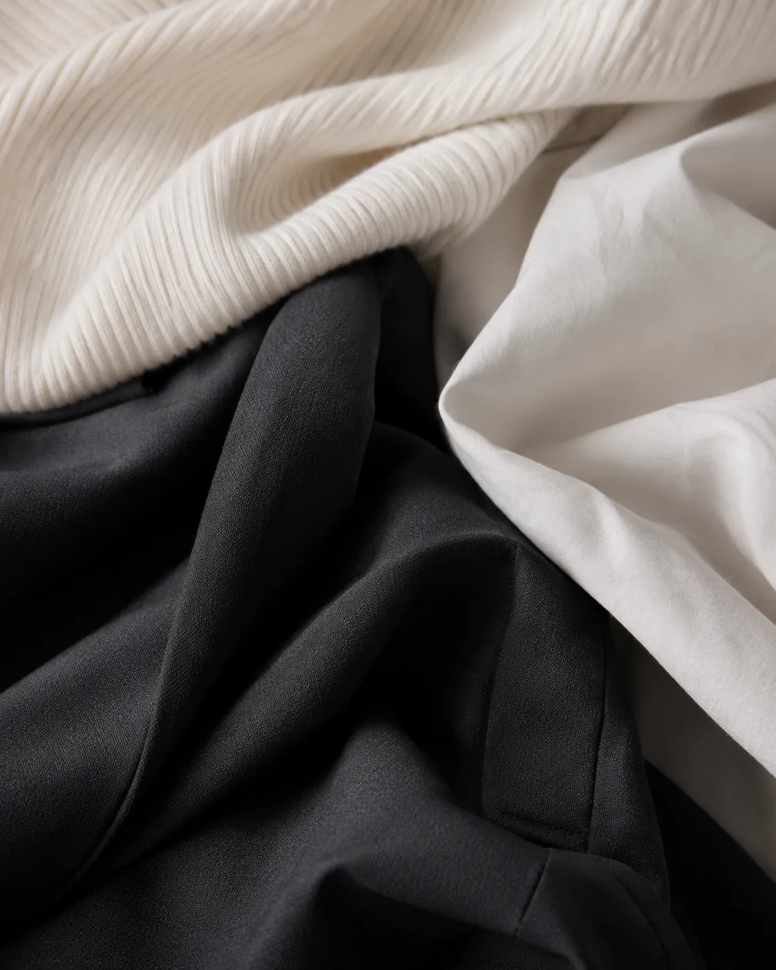 Neutral black, white, and cream fabric textures